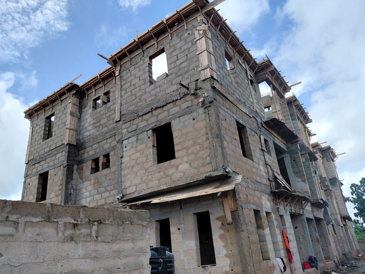 Multi-storey building under construction, block walls and formwork